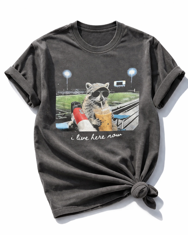 Plus/Reg Short Sleeve "I Live Here Now Raccoon" Football Graphic Tee