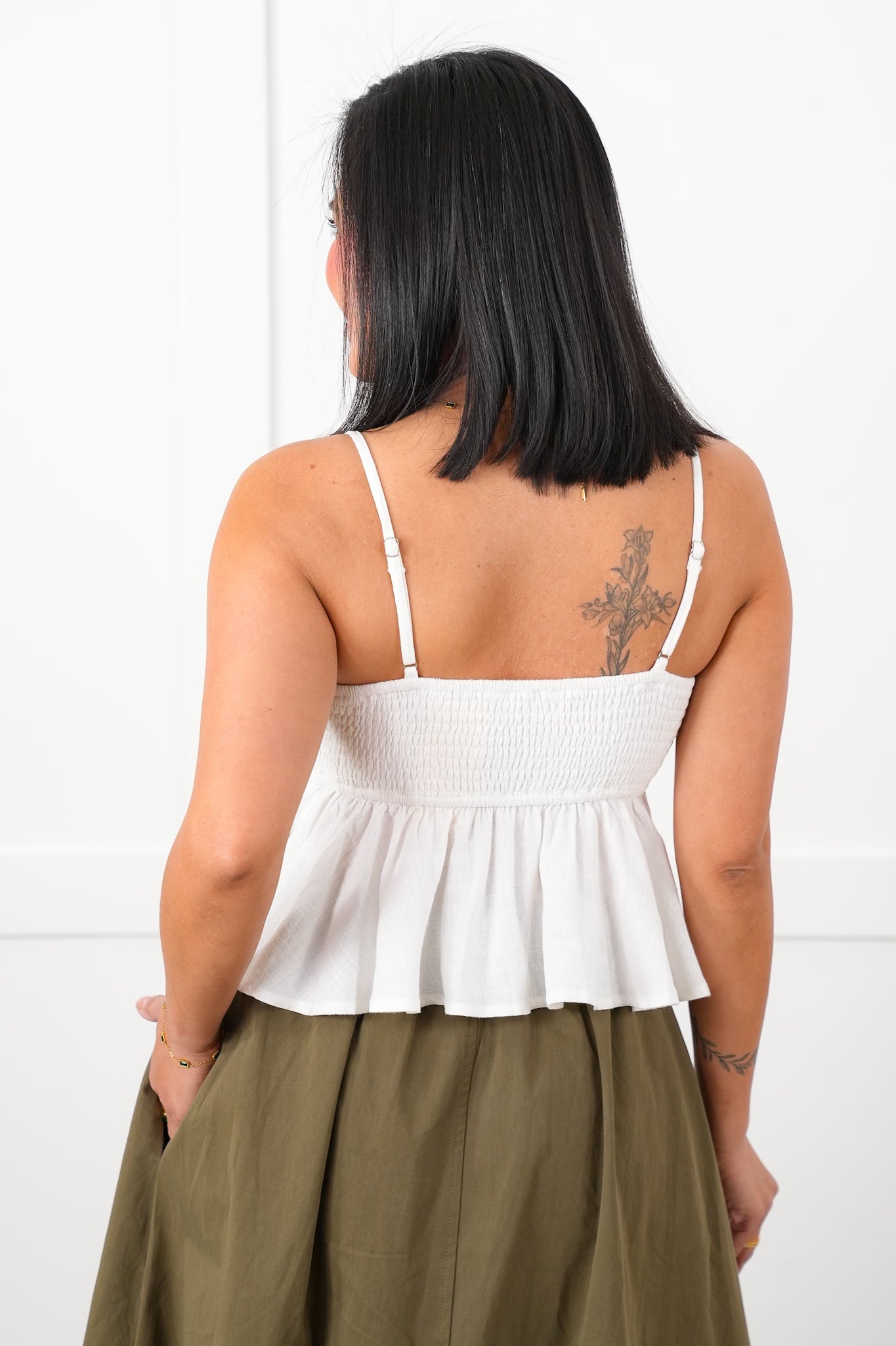 White Sleeveless Smocked Baby Doll Top