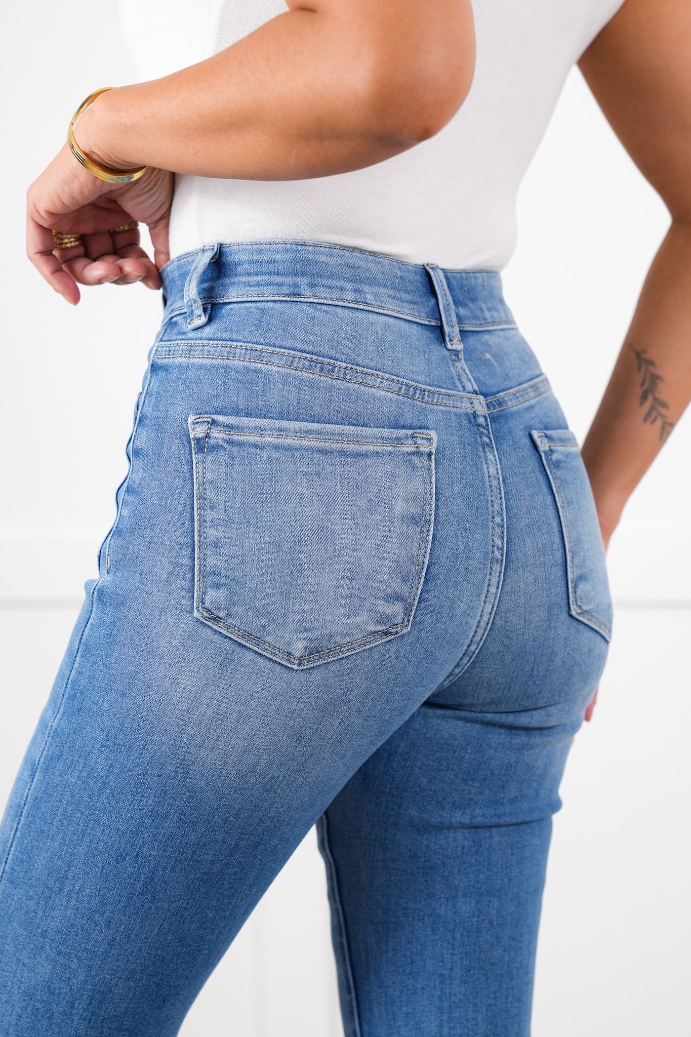 Risen High Rise Medium Wash Elastic Waistband Flare Front Patch Pocket Jeans