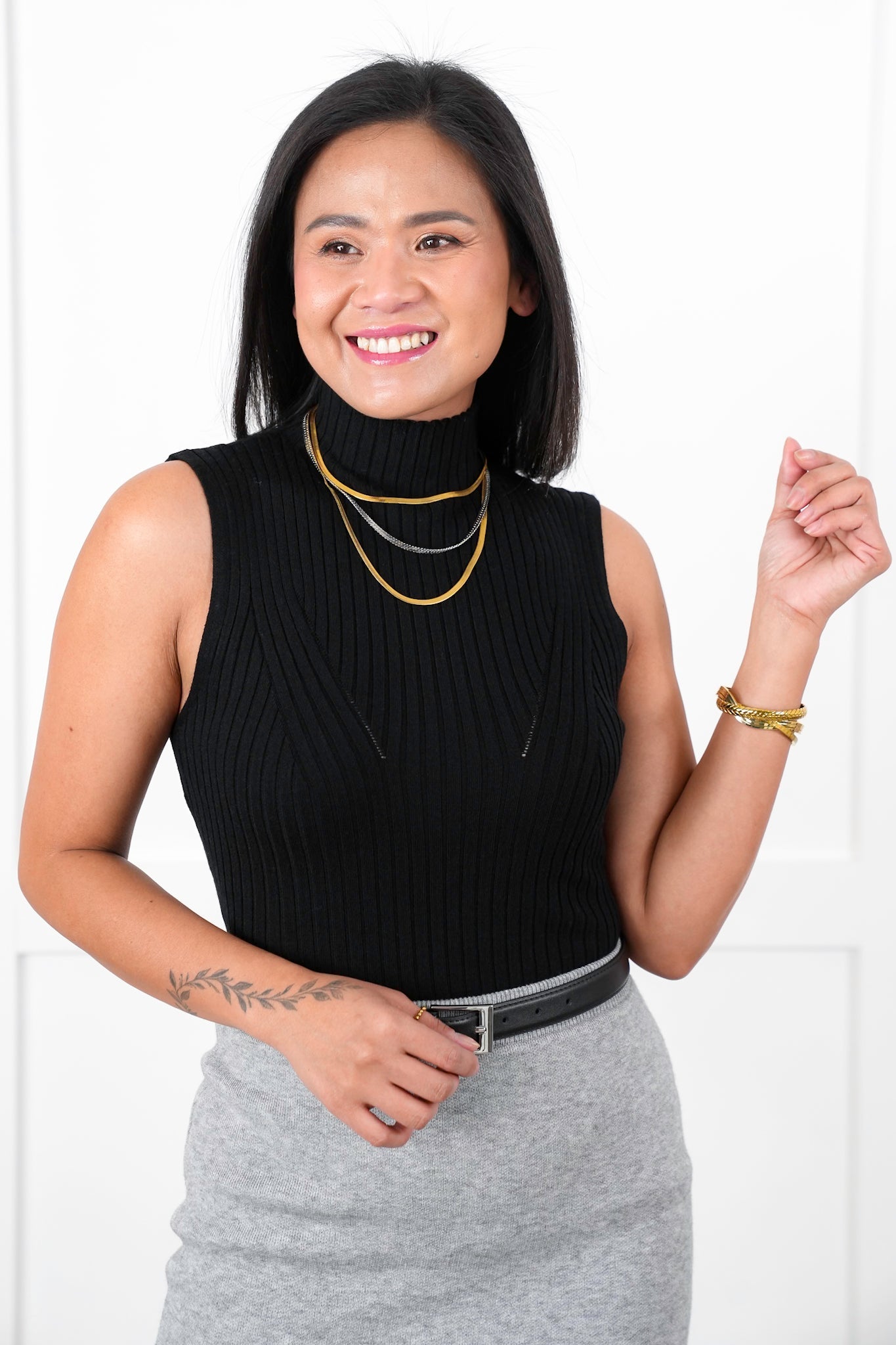 Ribbed Sleeveless Mock Neck Knit Top