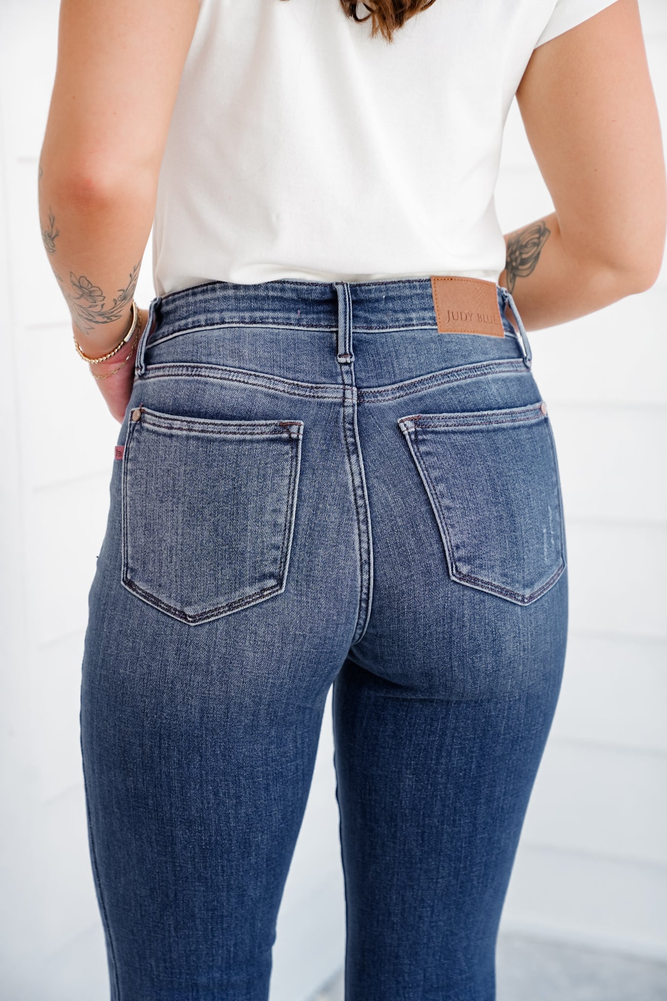Judy Blue Mid Rise Medium Vintage Wash Flare Jeans with Distressed and Frayed Hem