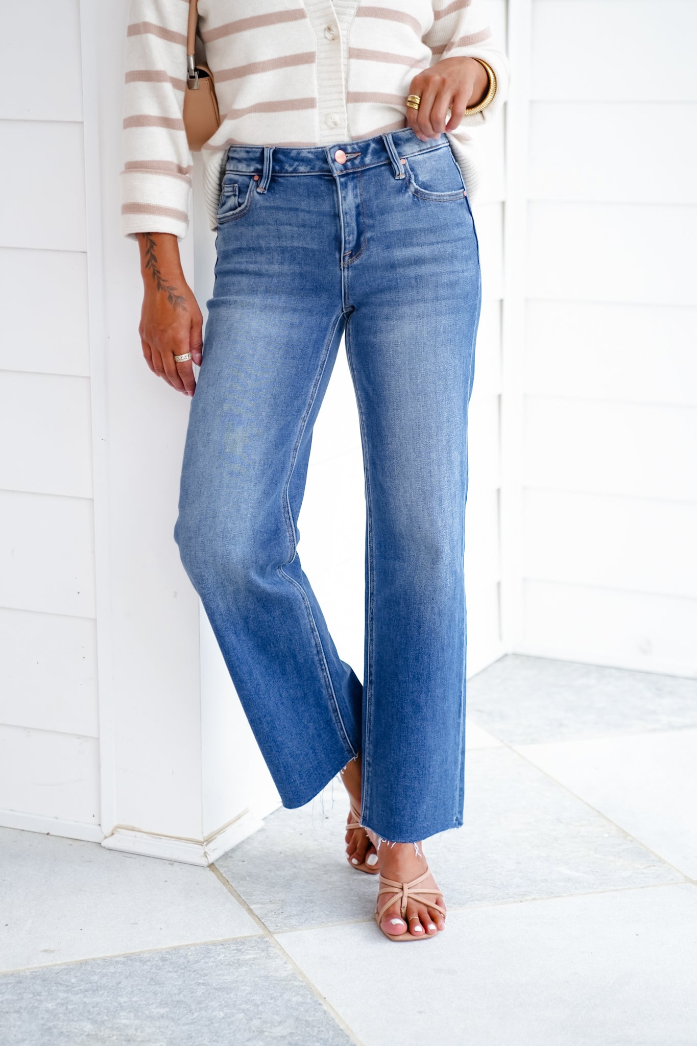 Risen Mid Rise Medium Wash Crop Straight Leg Jeans with Raw Hem