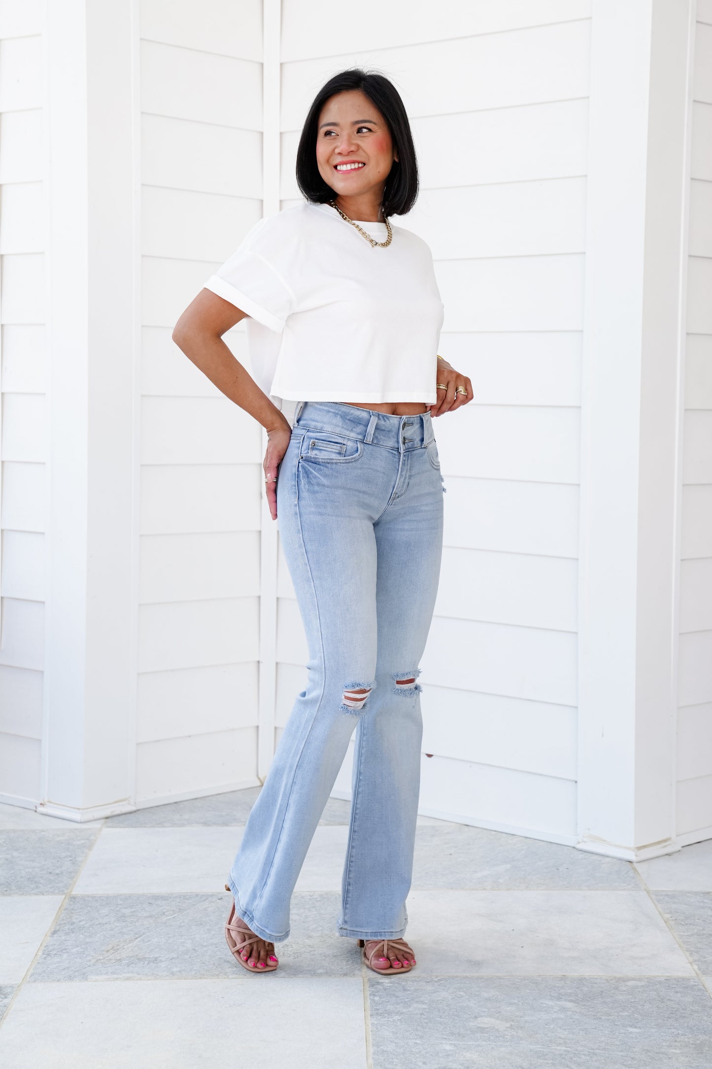 Cello Mid Rise Light Wash Two Button Distressed Flare Jeans