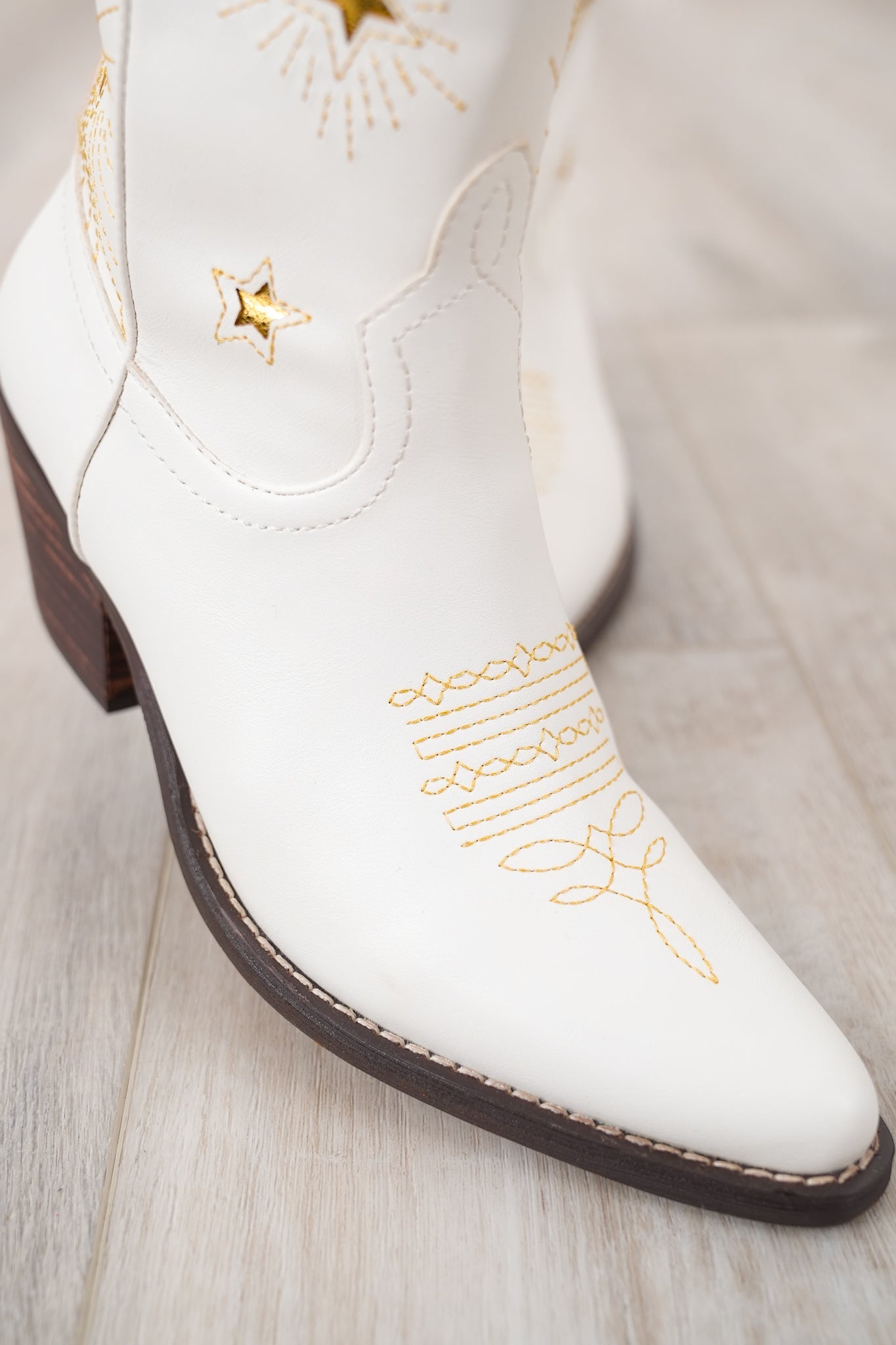 Western Knee High Heeled Boot with Star Cutout Accents
