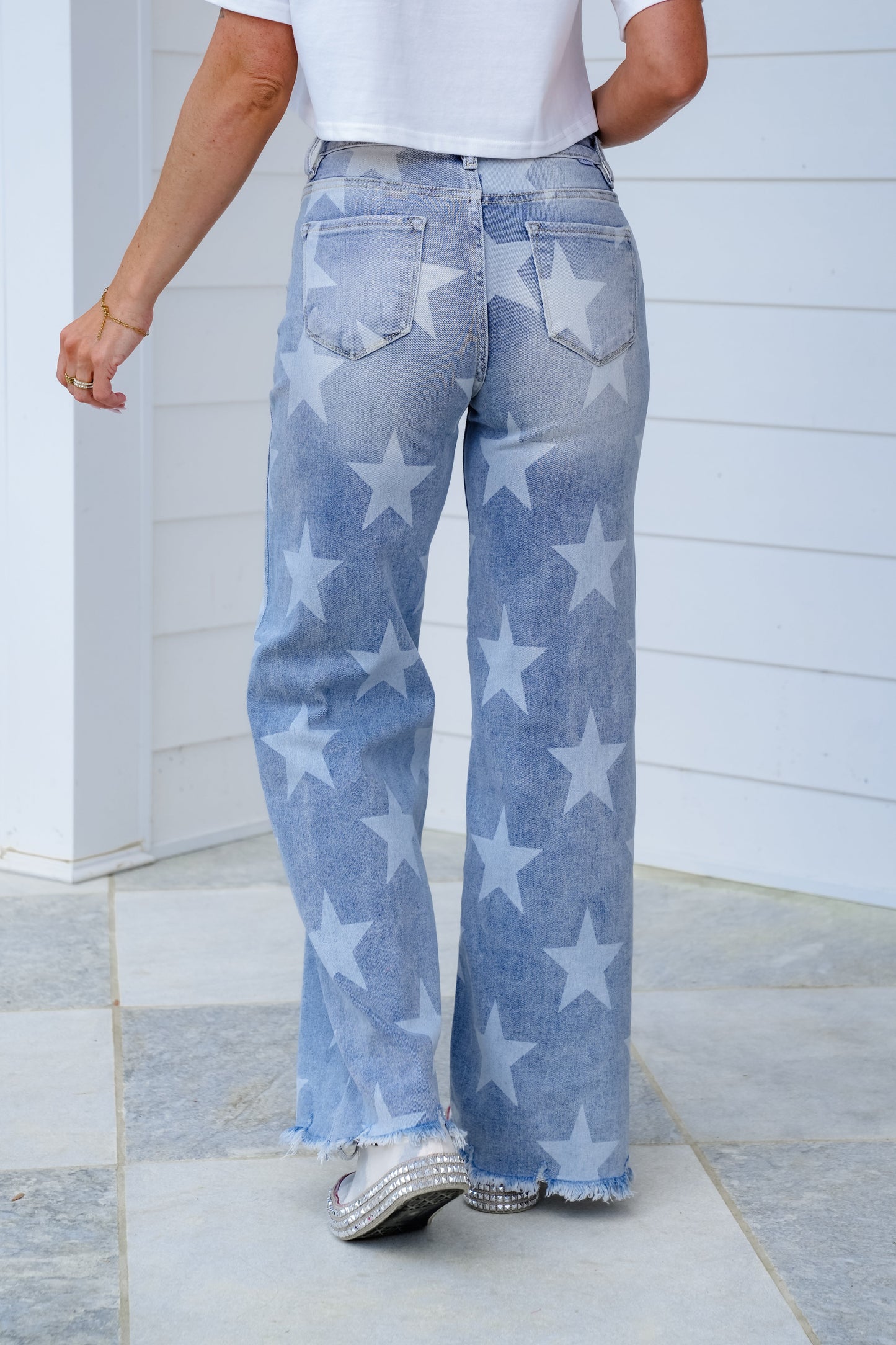 Risen High Rise Light Wash Wide Leg Star Print Jeans