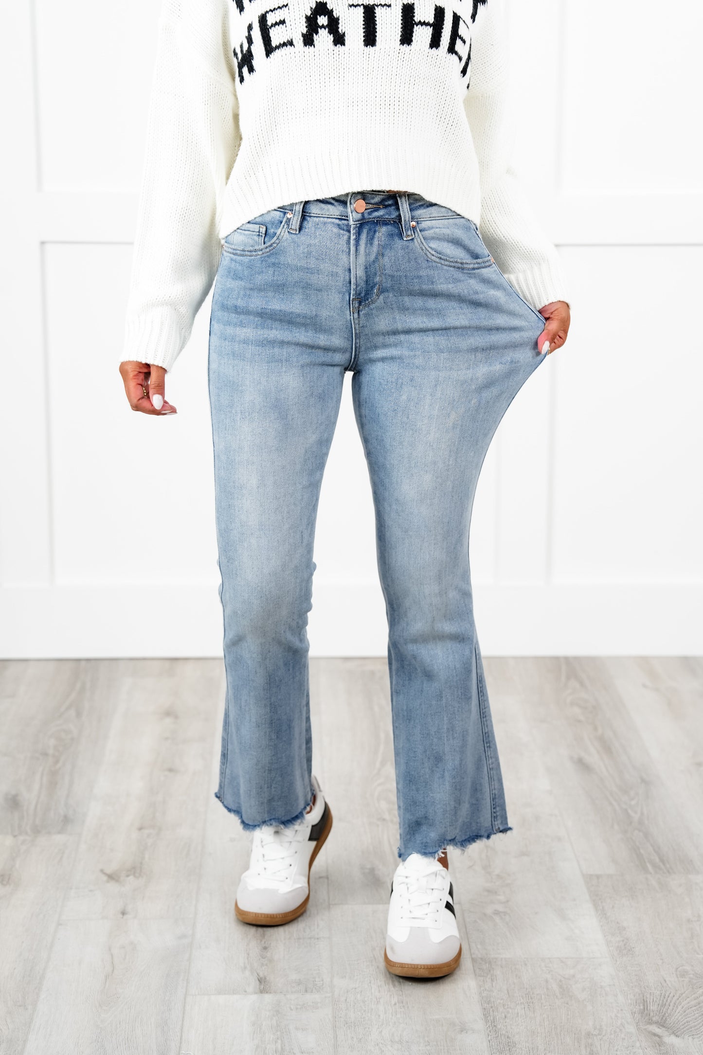 Mica High Rise Light Wash Uneven Hem Cropped Flare Jeans