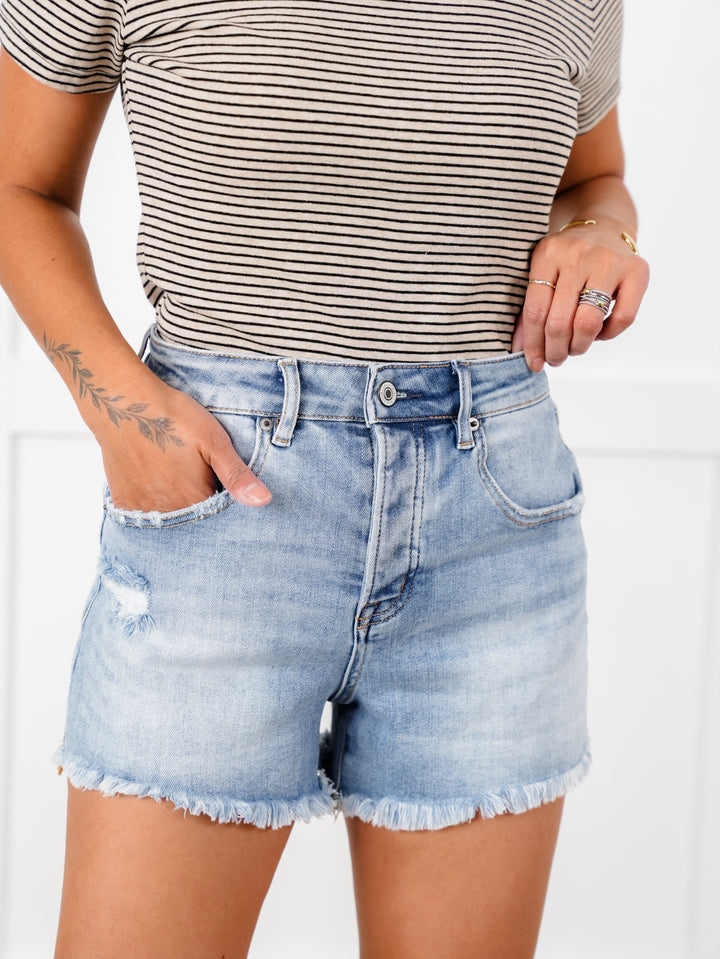 Mica Light Wash Distressed Button Fly Raw Hem Shorts