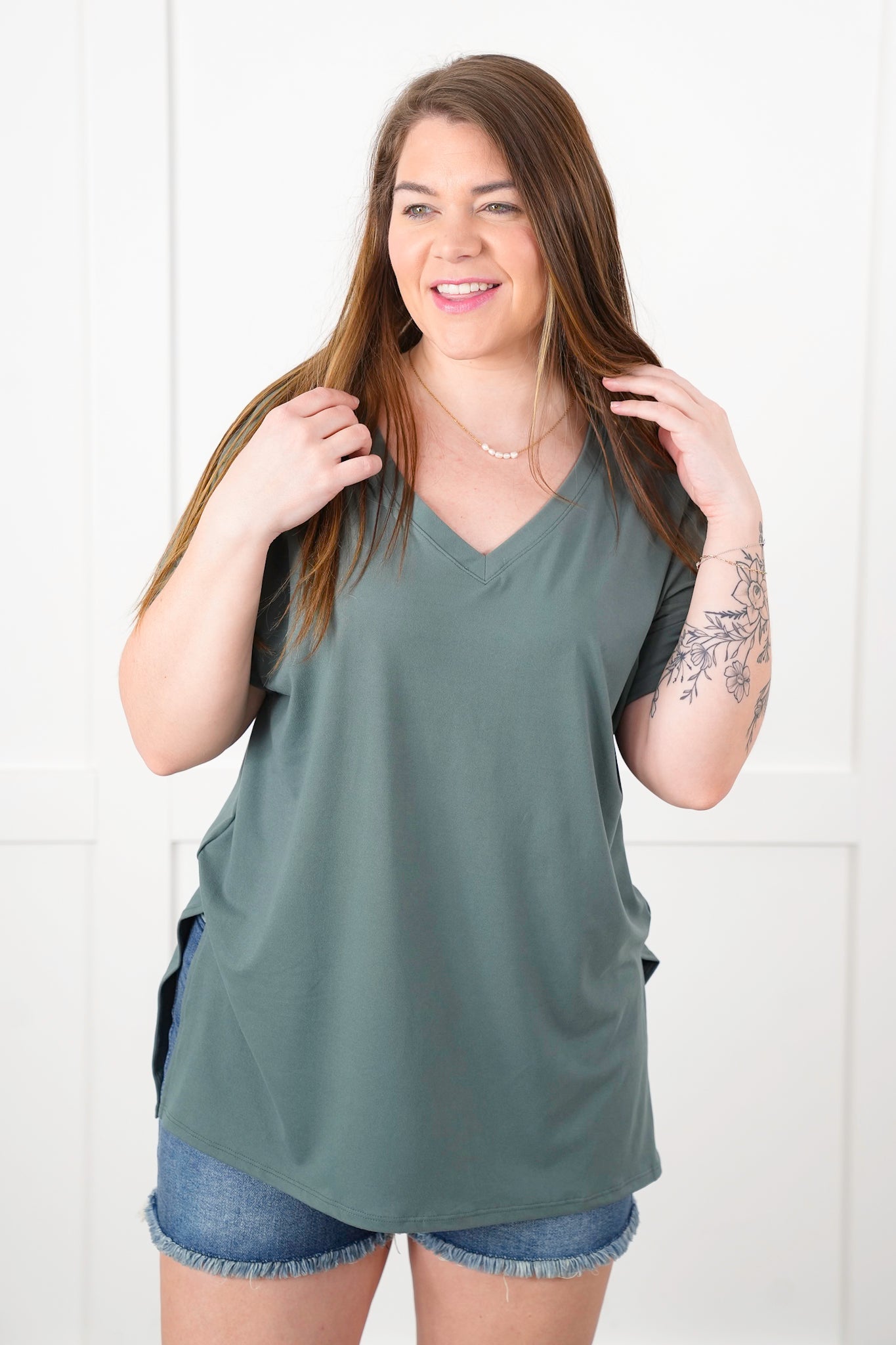 Door Buster! Zenana Rolled Short Sleeve V-Neck Top with Side Slit High-Low Hem