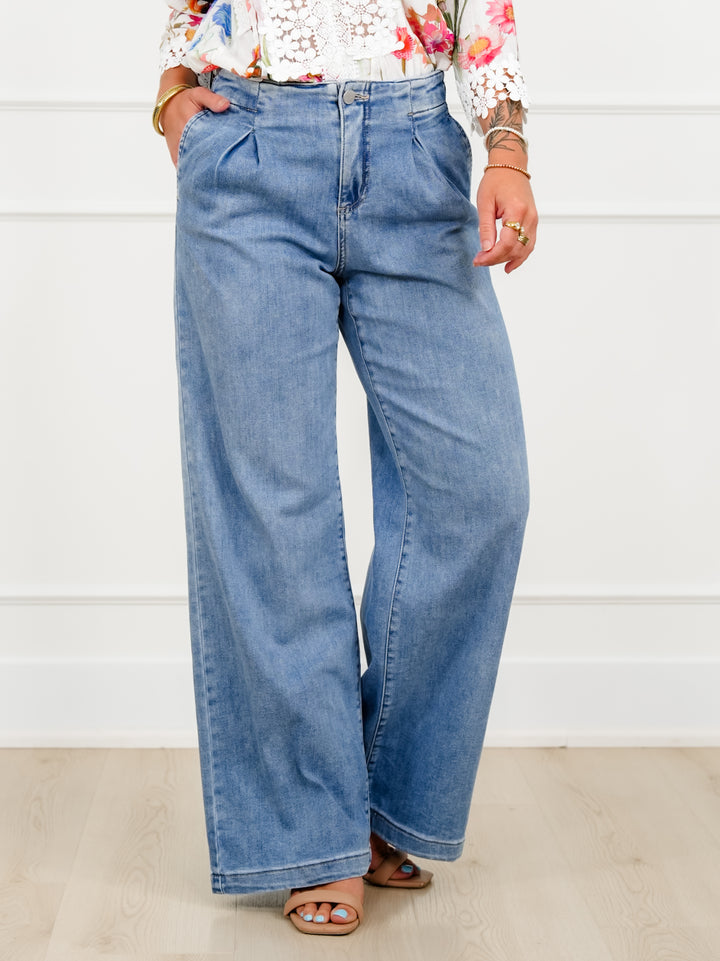 Risen Mid Rise Medium Wash Relaxed Waist Wide Leg Jeans