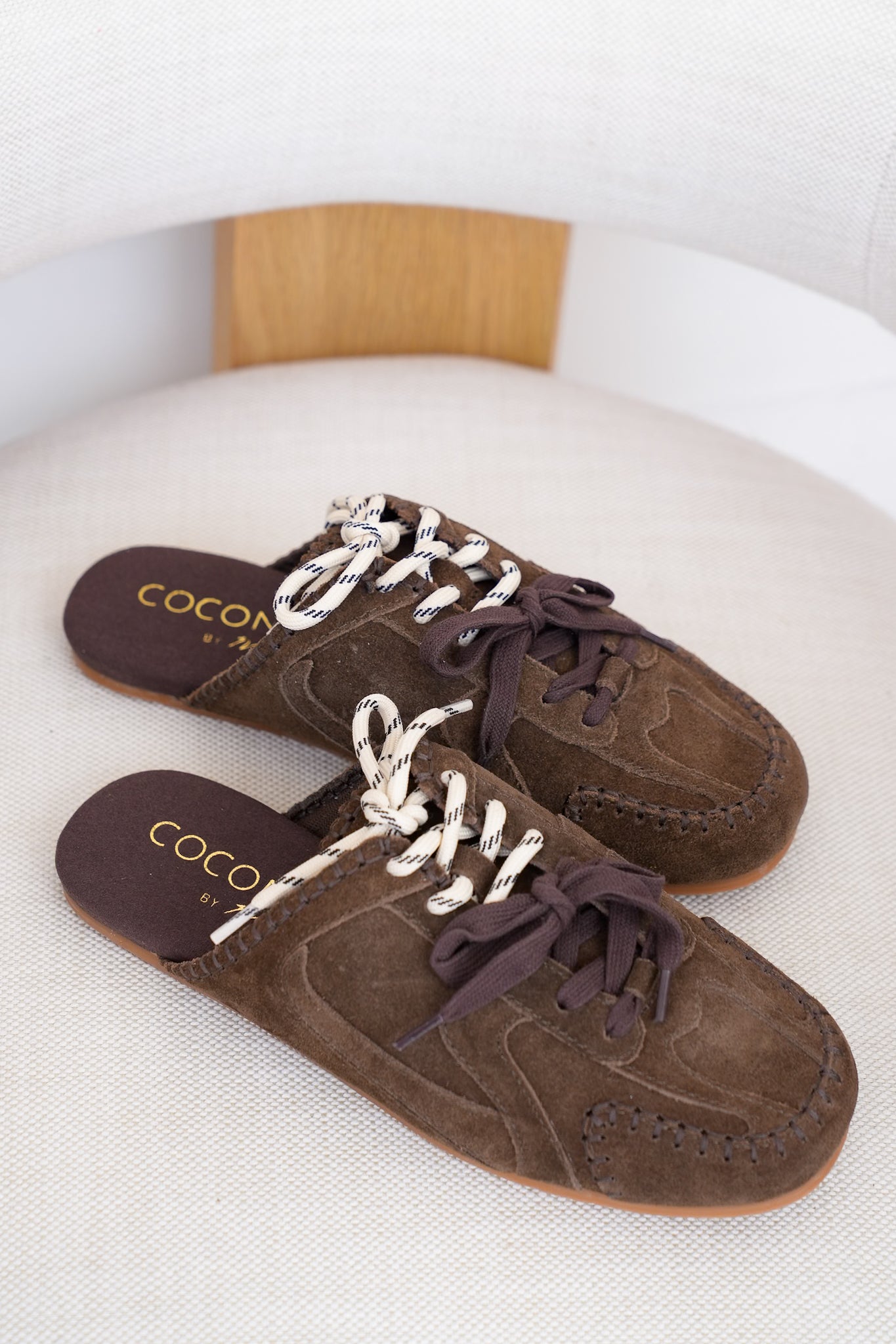 Slip On Mule with Moccasin Toe Stitching and Lace Up Detail
