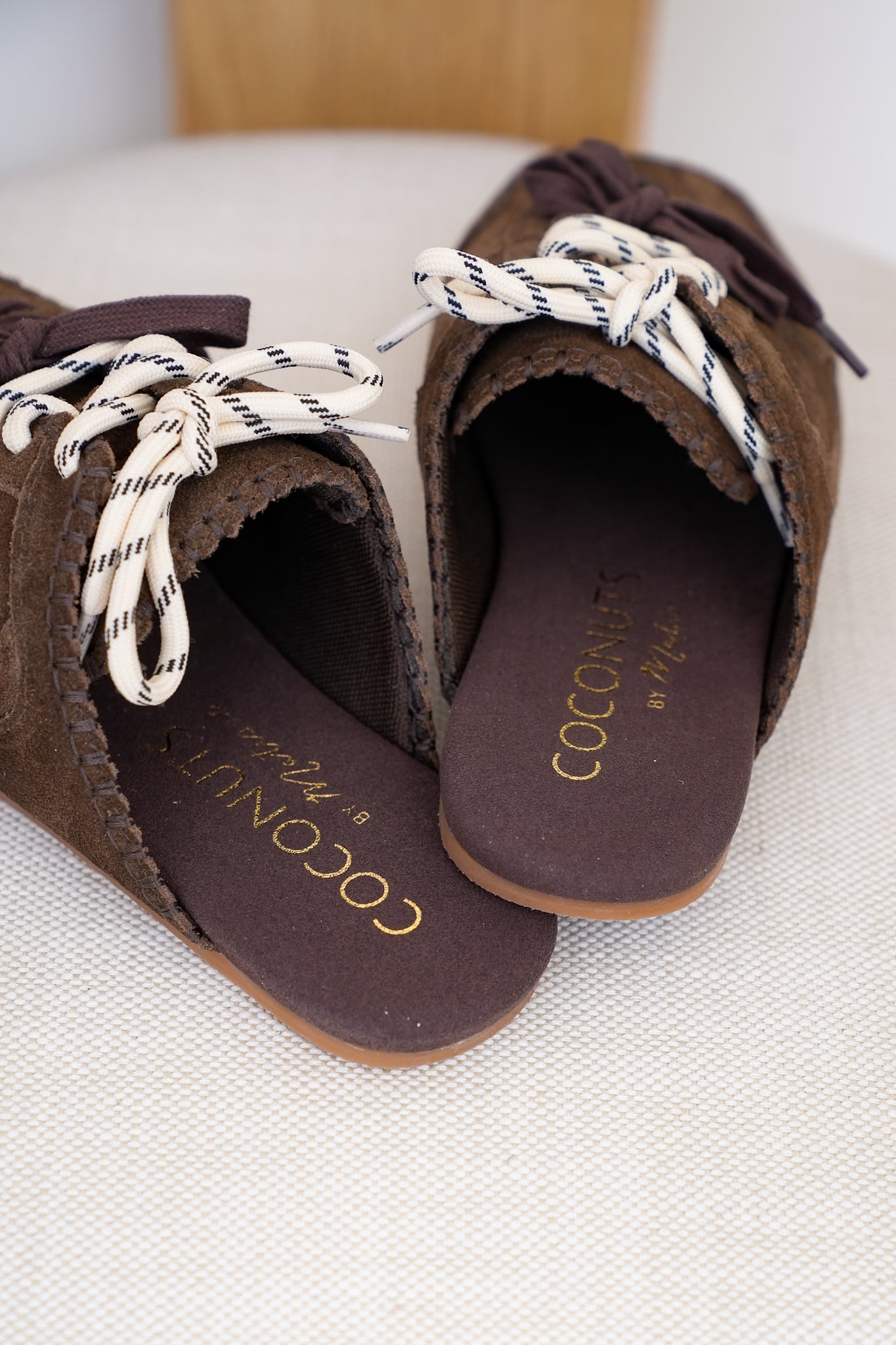Slip On Mule with Moccasin Toe Stitching and Lace Up Detail