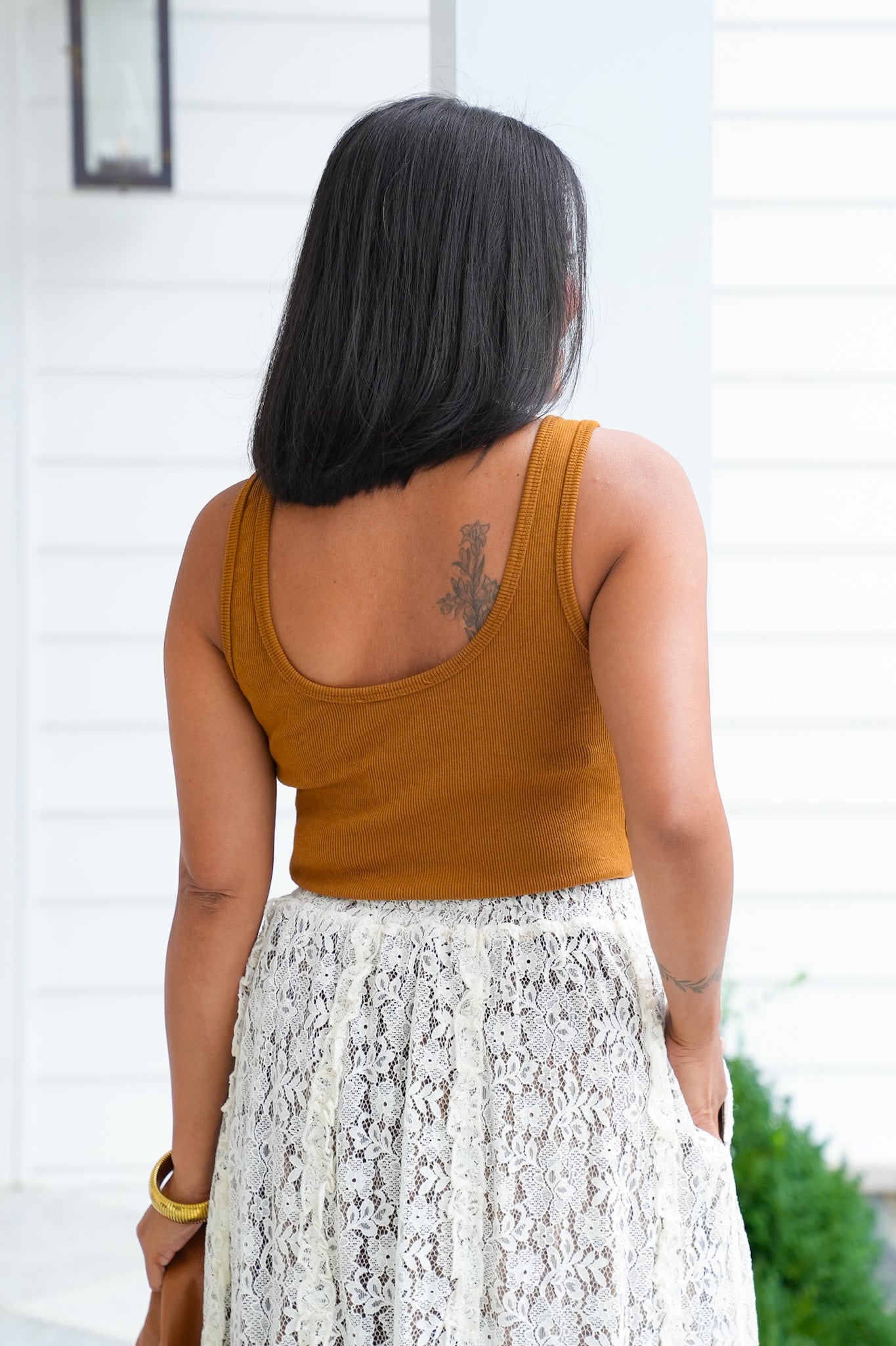 Sleeveless Ribbed Knit Bodysuit with Buckle Strap Detail