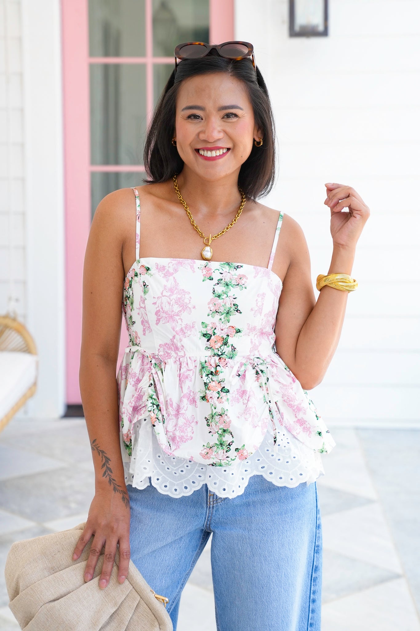 Floral Sleeveless Peplum Top with Eyelet Hem Detail