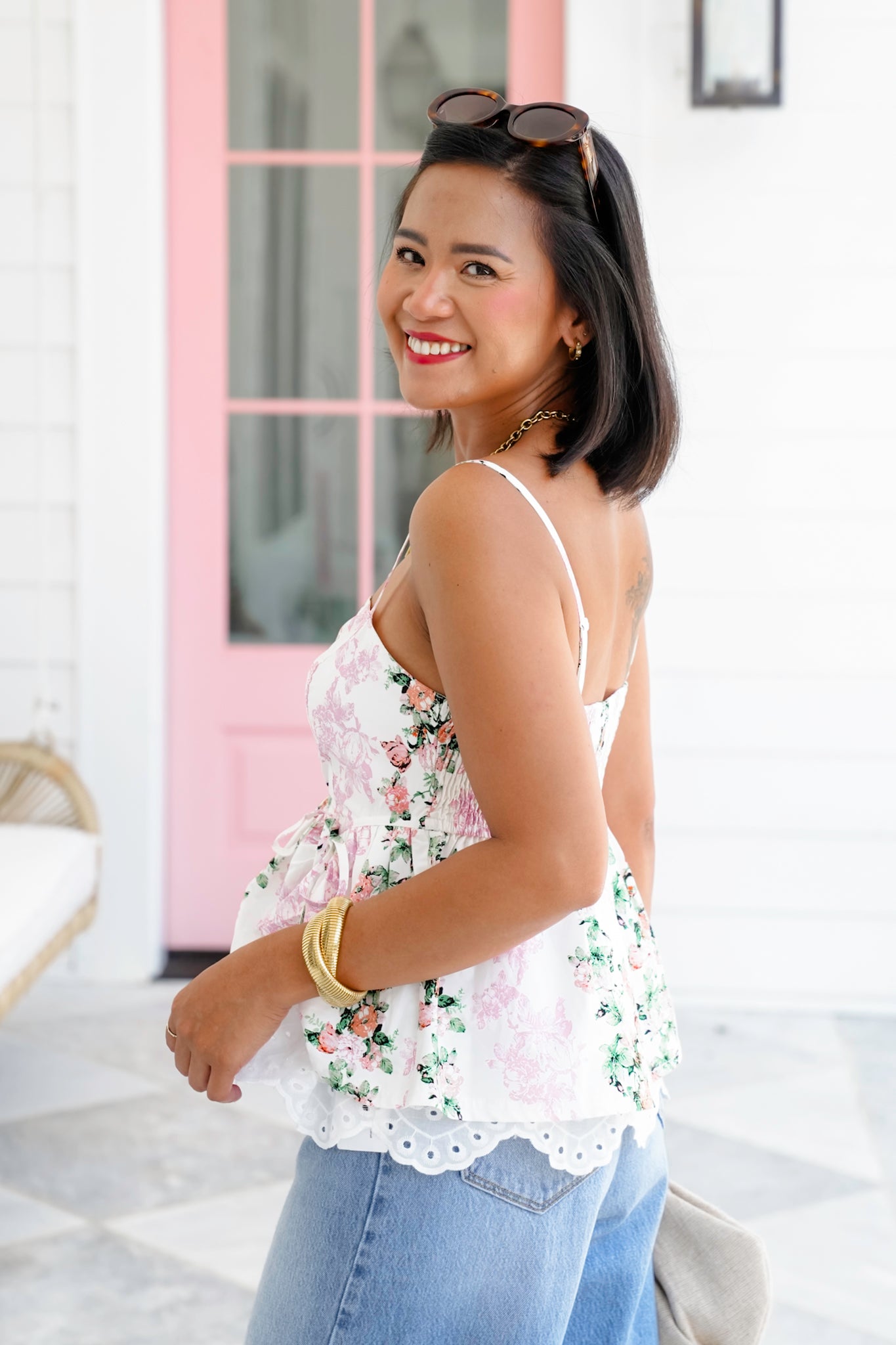 Floral Sleeveless Peplum Top with Eyelet Hem Detail
