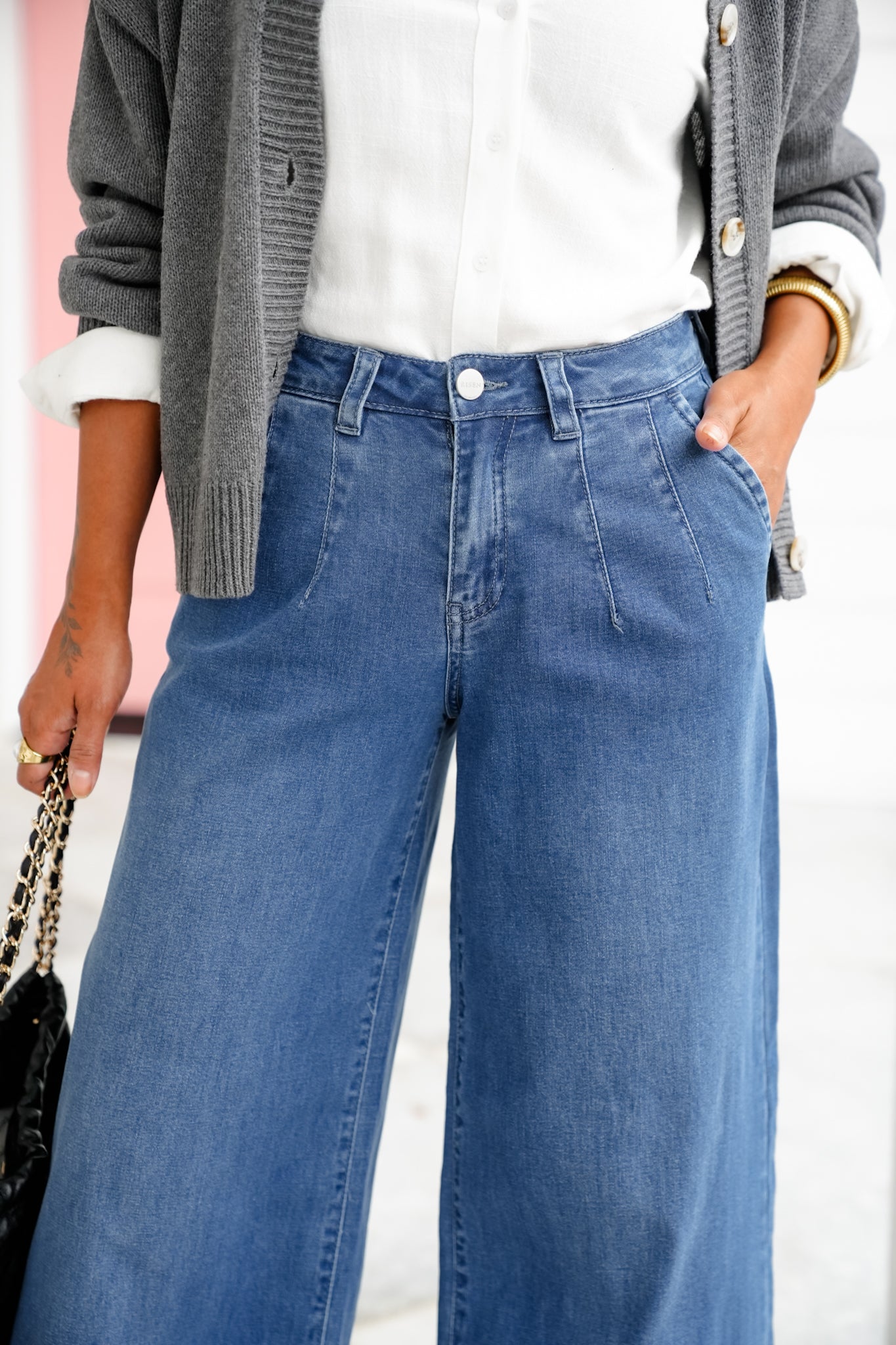 Risen Mid Rise Medium Wash Wide Leg Knit Jeans