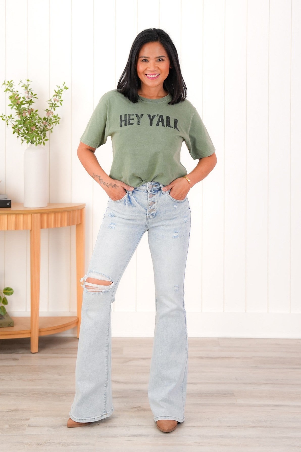 Risen Mid Rise Light Wash Button Down Flare Jeans