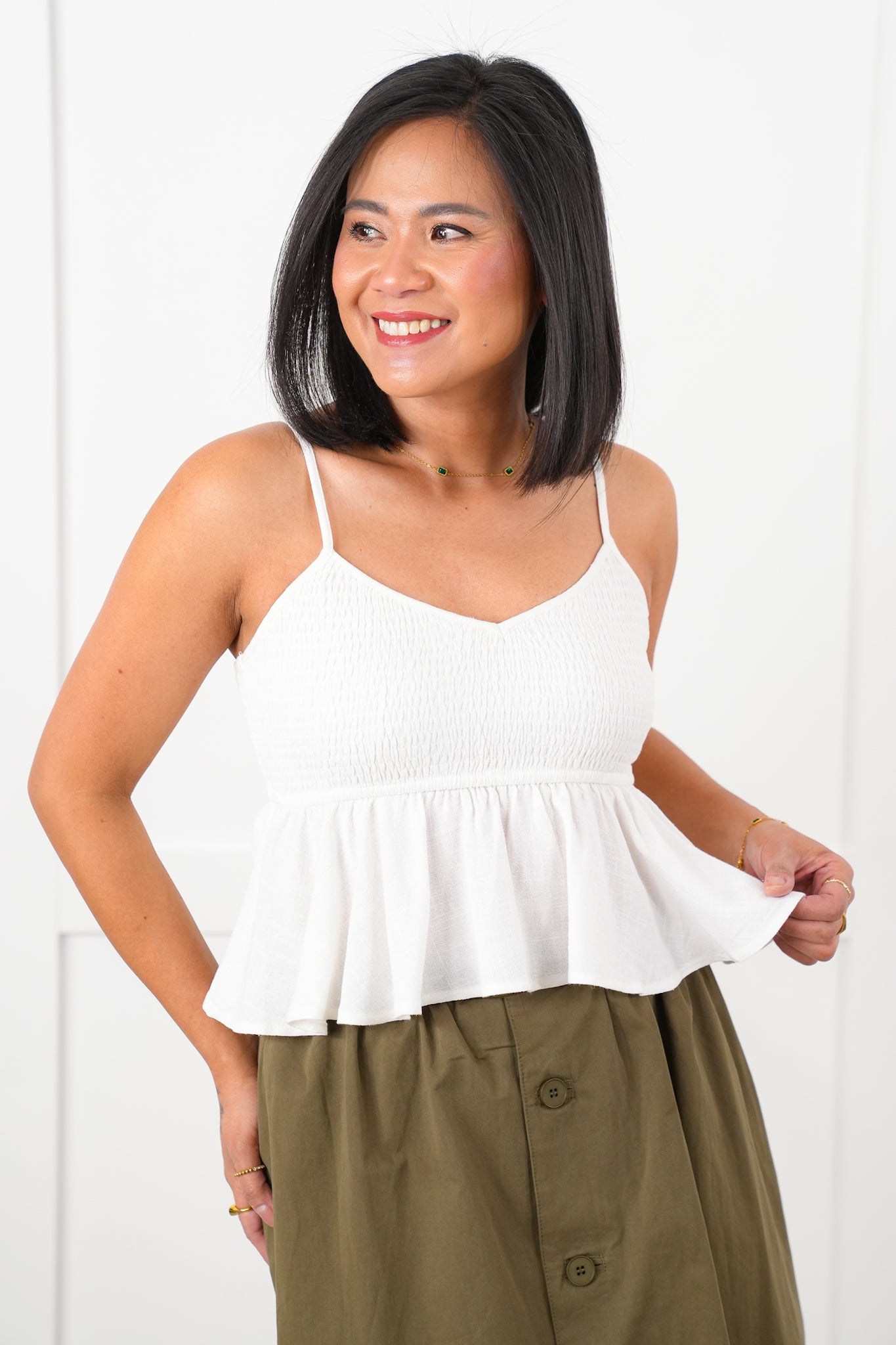 White Sleeveless Smocked Baby Doll Top