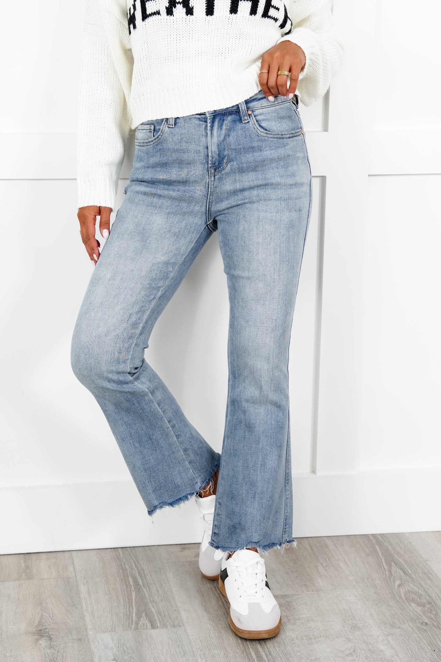 Mica High Rise Light Wash Uneven Hem Cropped Flare Jeans
