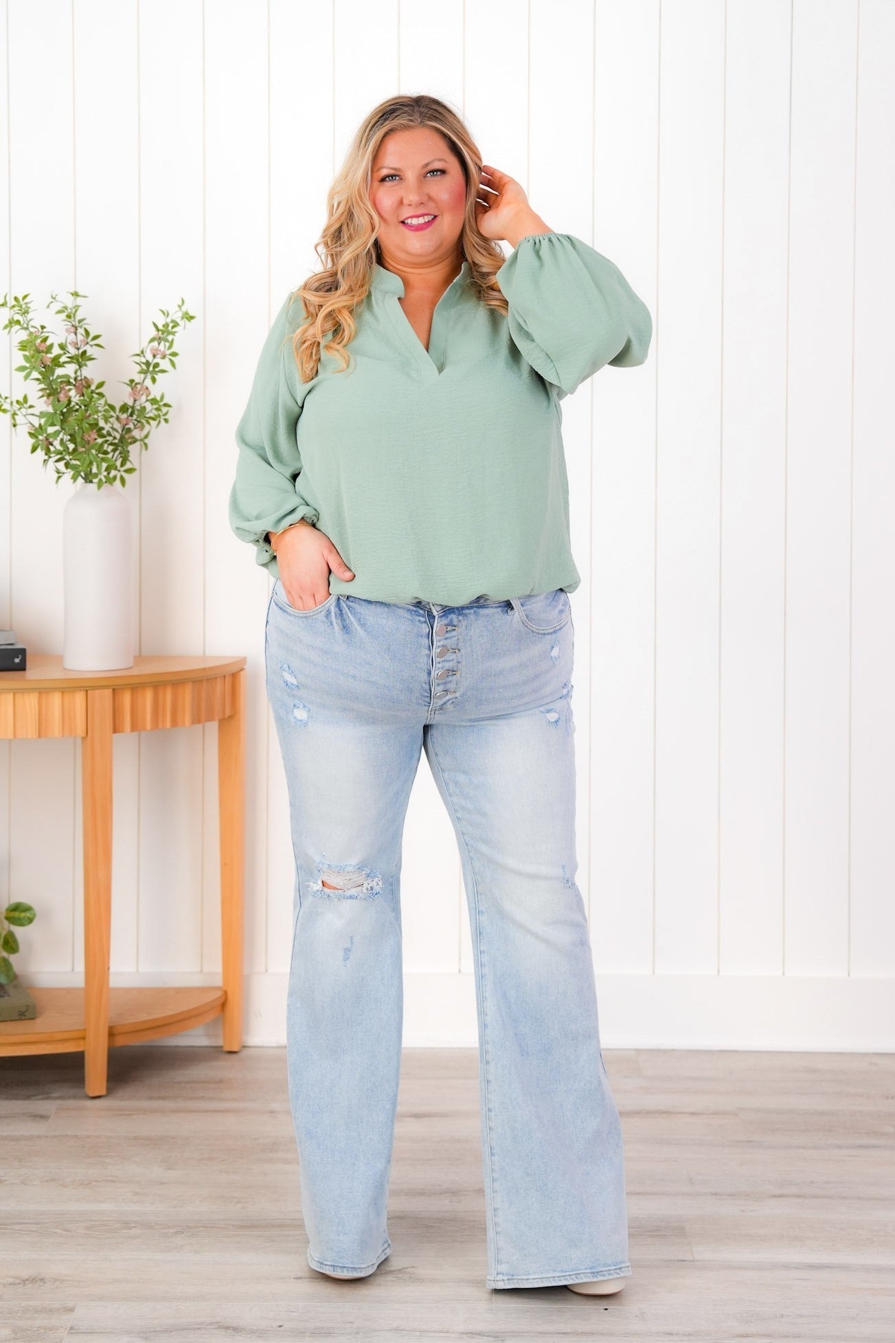 Risen Mid Rise Light Wash Button Down Flare Jeans