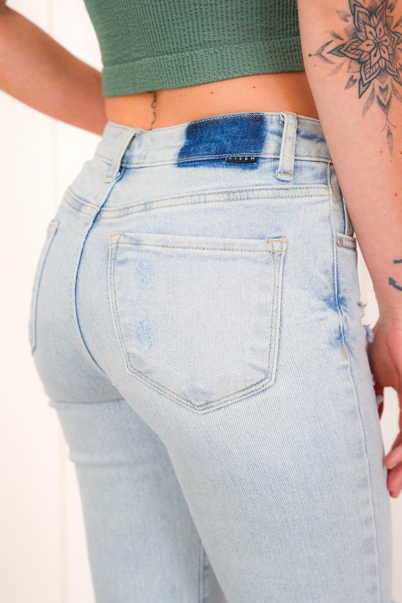 Risen Mid Rise Light Wash Button Down Flare Jeans