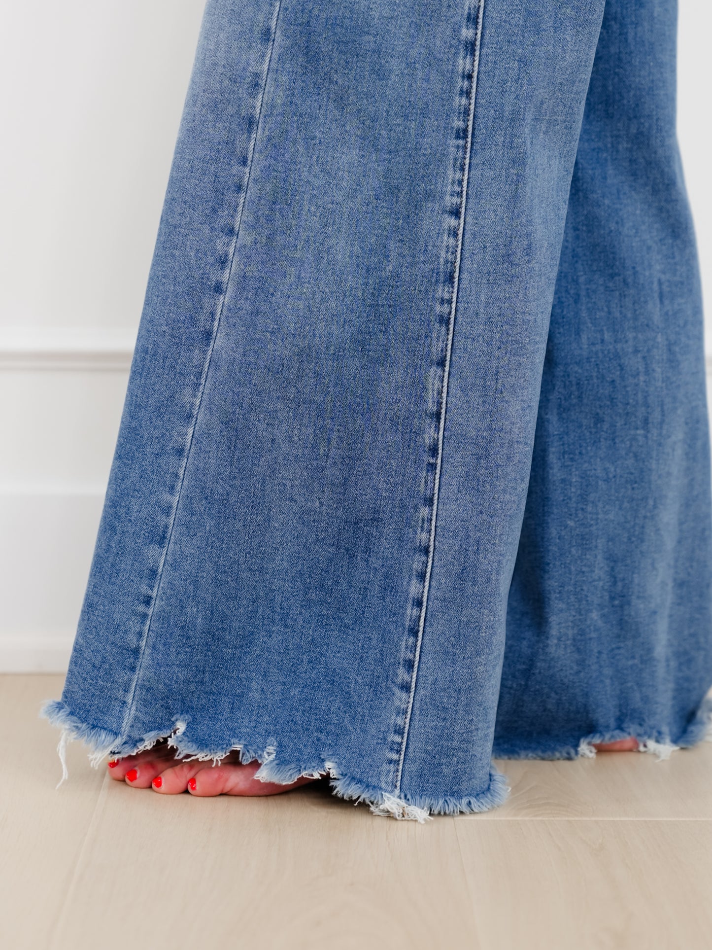 Risen High Rise Medium Wash Wide Leg Jeans