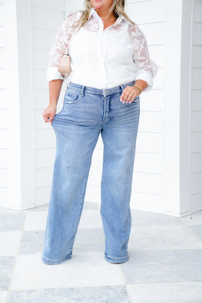Risen Mid Rise Light Wash Tummy Control Elastic Waistband Wide Leg Jeans