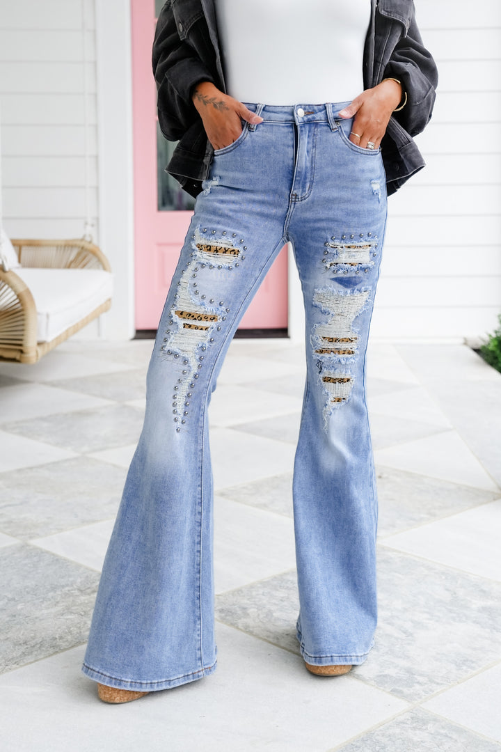 Distressed Denim Flare Jeans with Leopard Detail