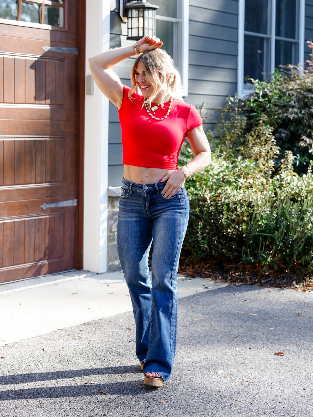 Risen Mid Rise Medium Wash Flare Jeans With Double Side Seam