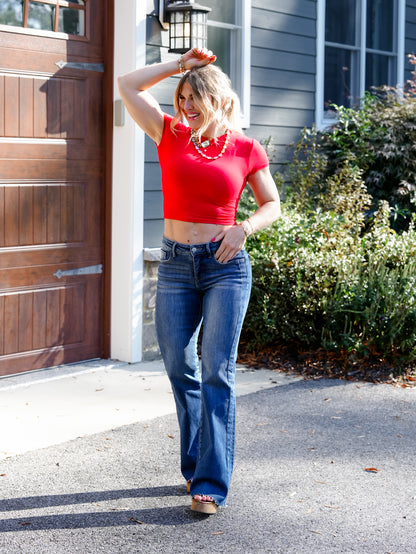 Risen Mid Rise Medium Wash Flare Jeans With Double Side Seam