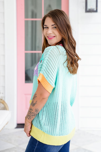 Loose Knit Short Sleeve Sweater with Crocheted Flower Detail