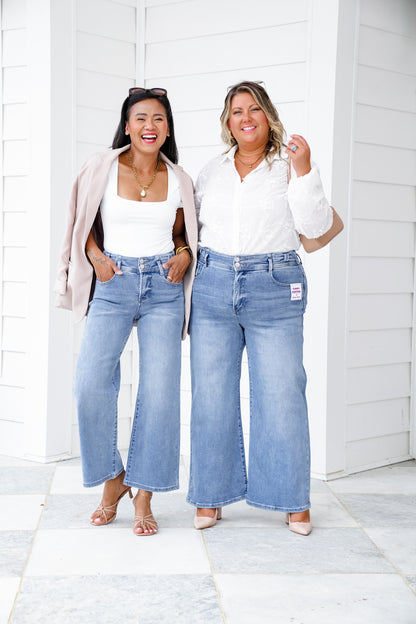 Risen High Rise Medium Wash Tummy Control Crop Wide Leg Jeans with Bow Detail