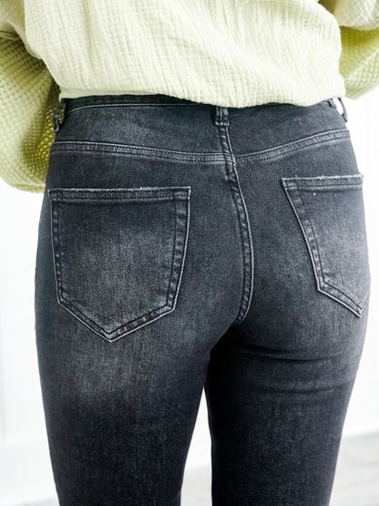 Risen Black Mid Rise Button Fly Relaxed Fit Skinny Jeans