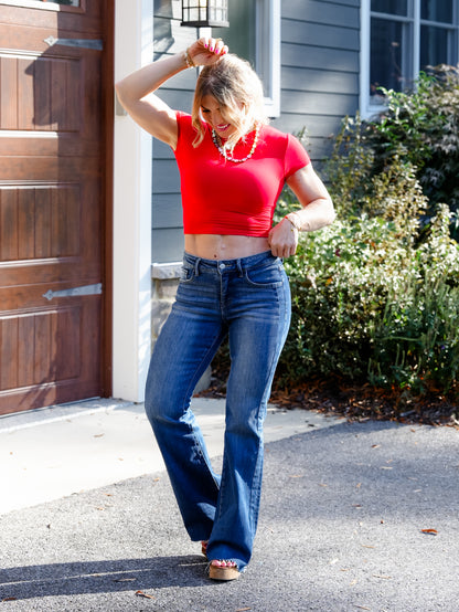 Risen Mid Rise Medium Wash Flare Jeans With Double Side Seam