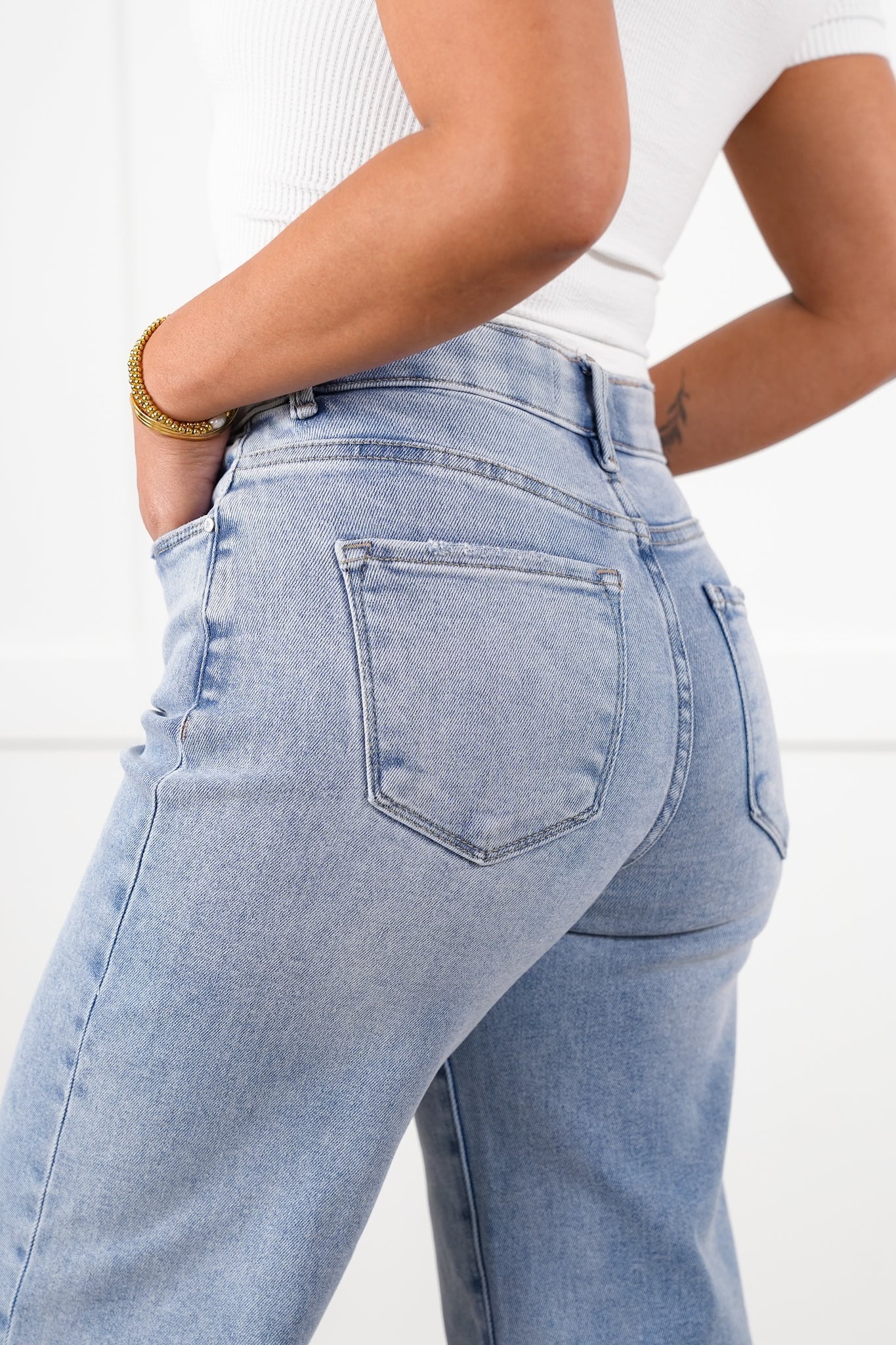 Risen High Rise Light Wash Tummy Control Elastic Waistband Cropped Wide Leg Jeans