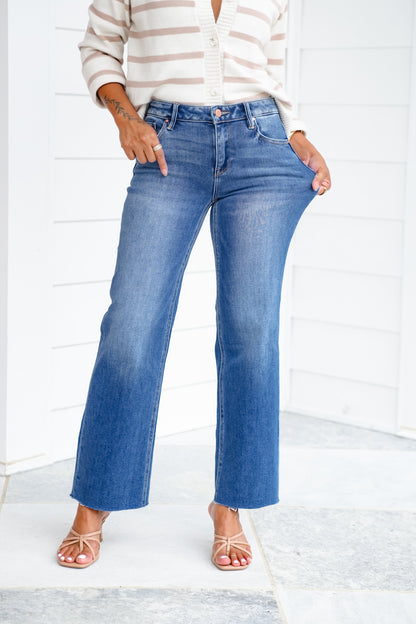 Risen Mid Rise Medium Wash Crop Straight Leg Jeans with Raw Hem