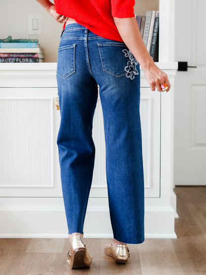 Risen Mid Rise Dark Wash Straight Leg Jeans with Flower Patch