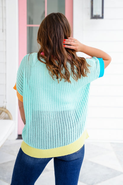 Loose Knit Short Sleeve Sweater with Crocheted Flower Detail