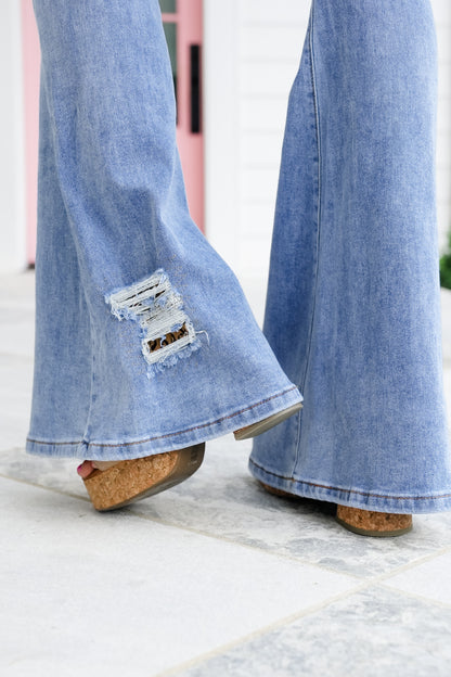 Distressed Denim Flare Jeans with Leopard Detail