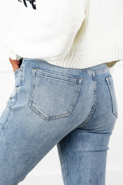Mica High Rise Light Wash Uneven Hem Cropped Flare Jeans