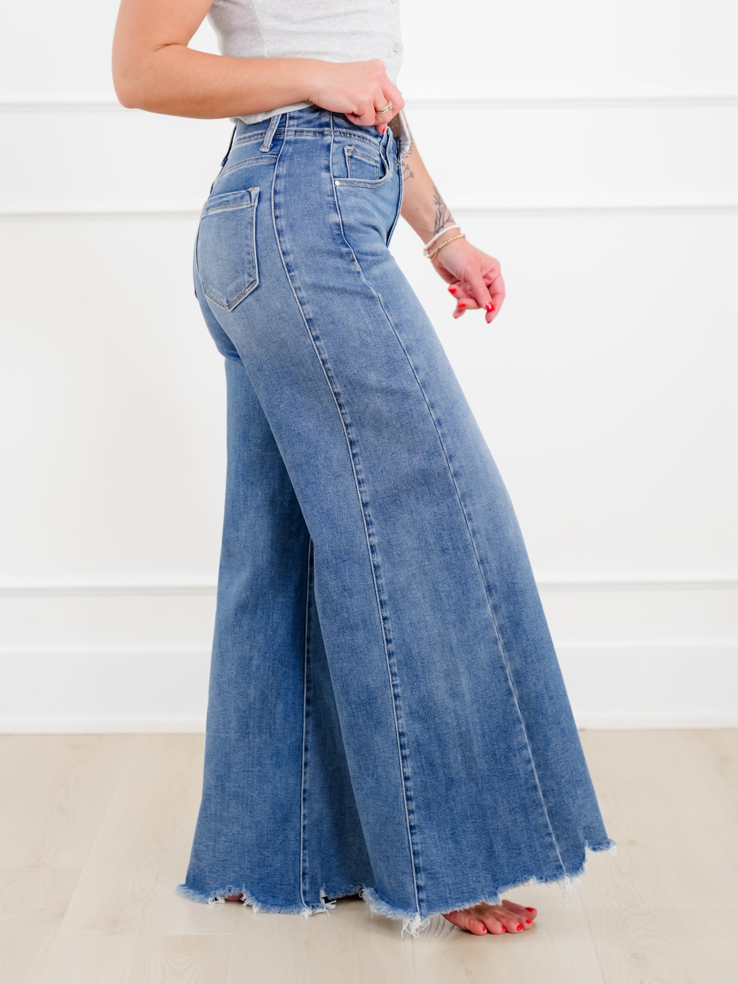 Risen High Rise Medium Wash Wide Leg Jeans