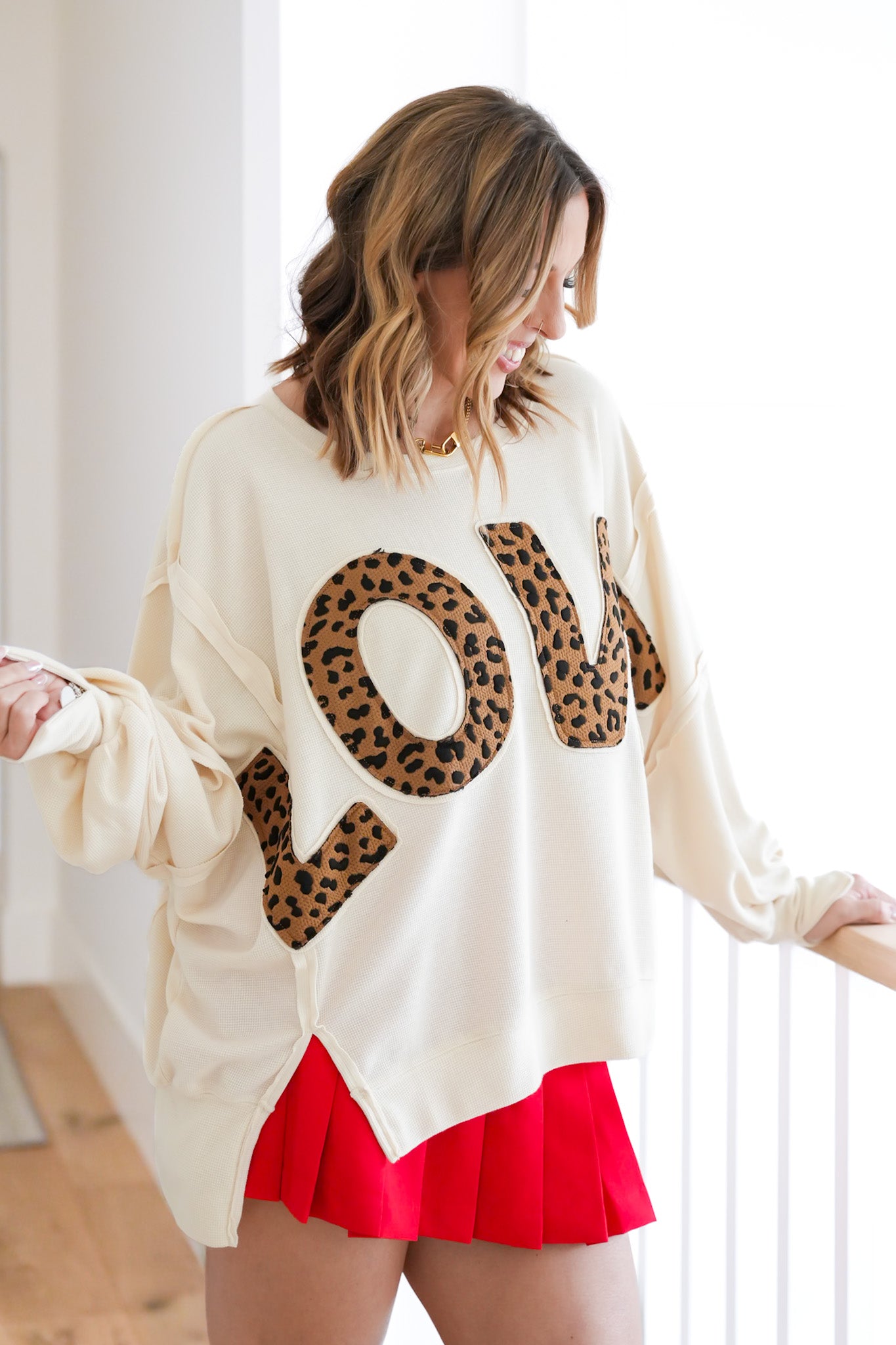 Plus/Reg Long Sleeve Leopard "LOVE" Patch Top with Reverse Seam Detail