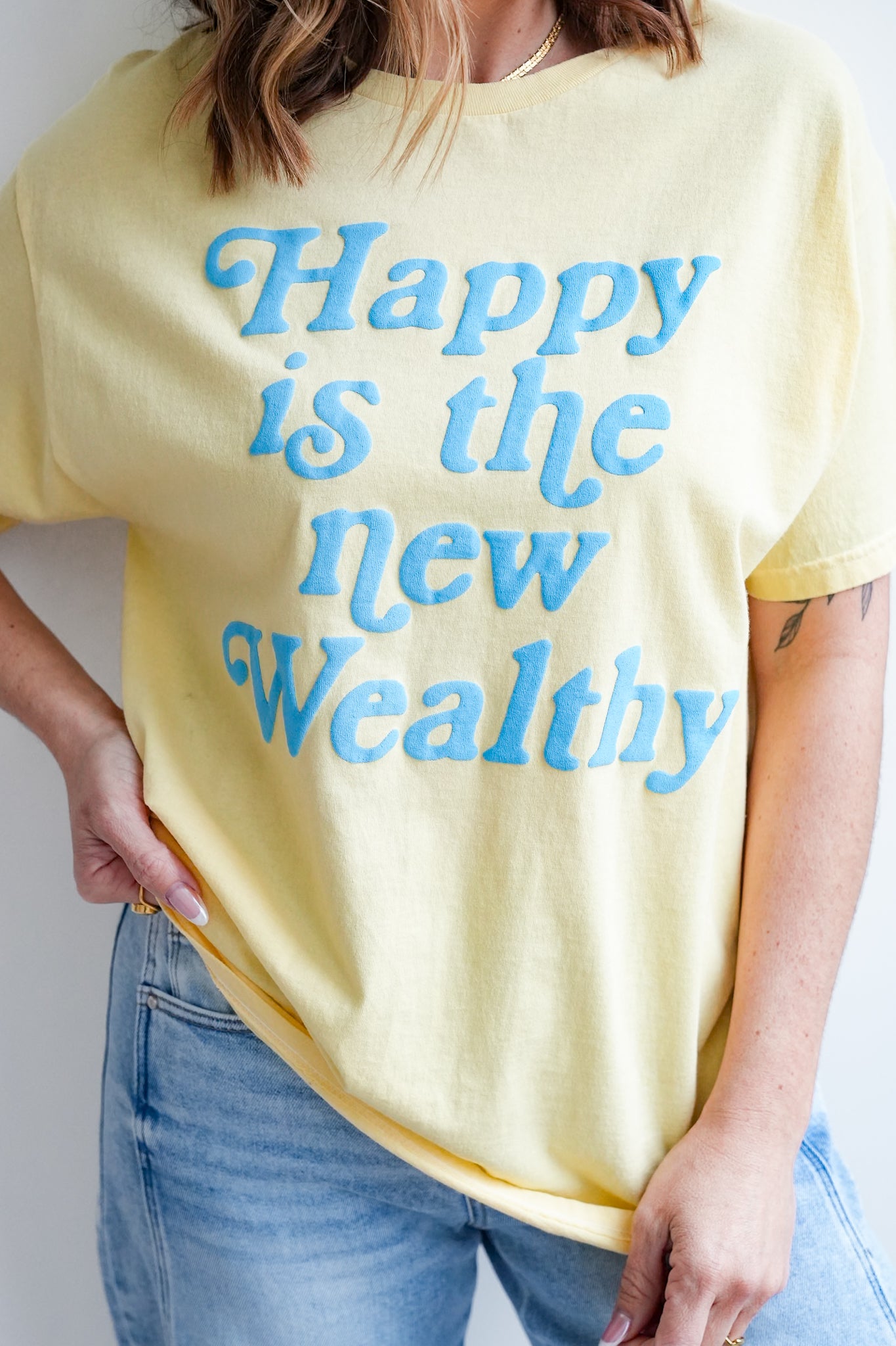 Short Sleeve Puff Print "Happy Is The New Wealthy" Graphic Tee