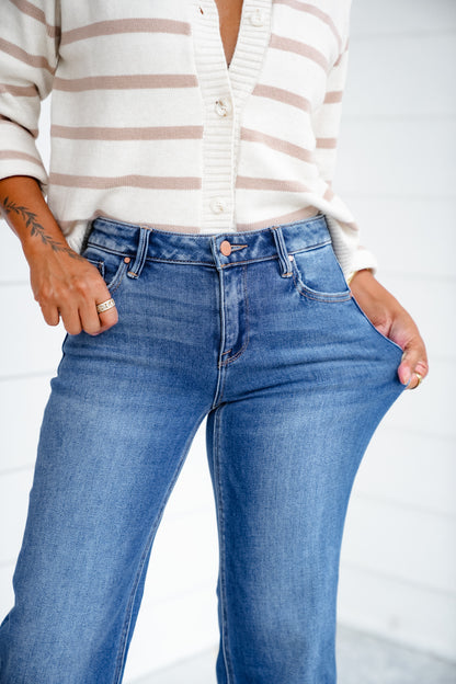 Risen Mid Rise Medium Wash Crop Straight Leg Jeans with Raw Hem
