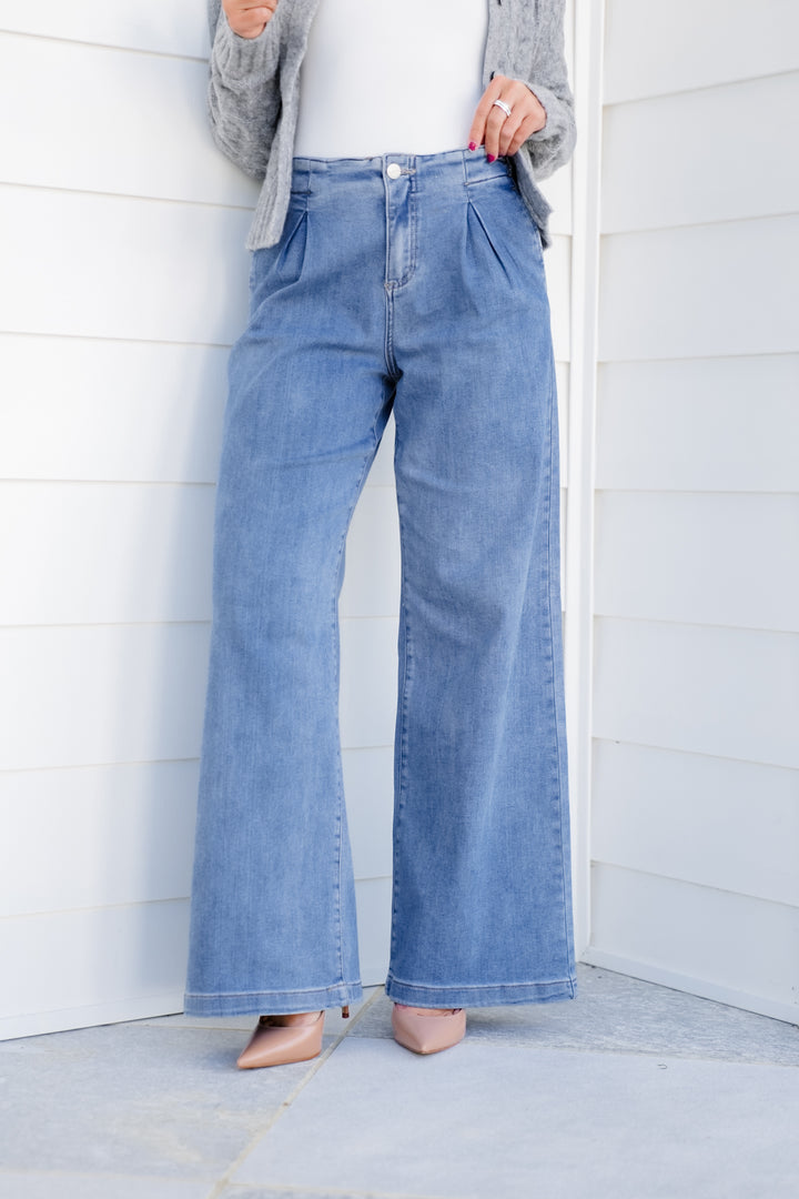 Risen Mid Rise Medium Wash Relaxed Waist Wide Leg Jeans