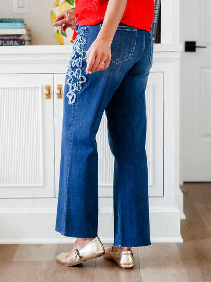 Risen Mid Rise Dark Wash Straight Leg Jeans with Flower Patch