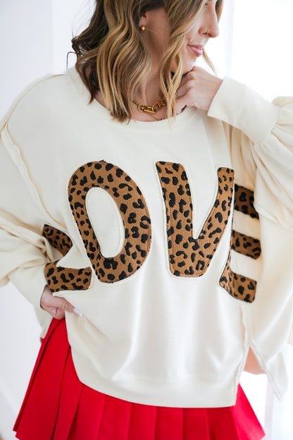 Plus/Reg Long Sleeve Leopard "LOVE" Patch Top with Reverse Seam Detail