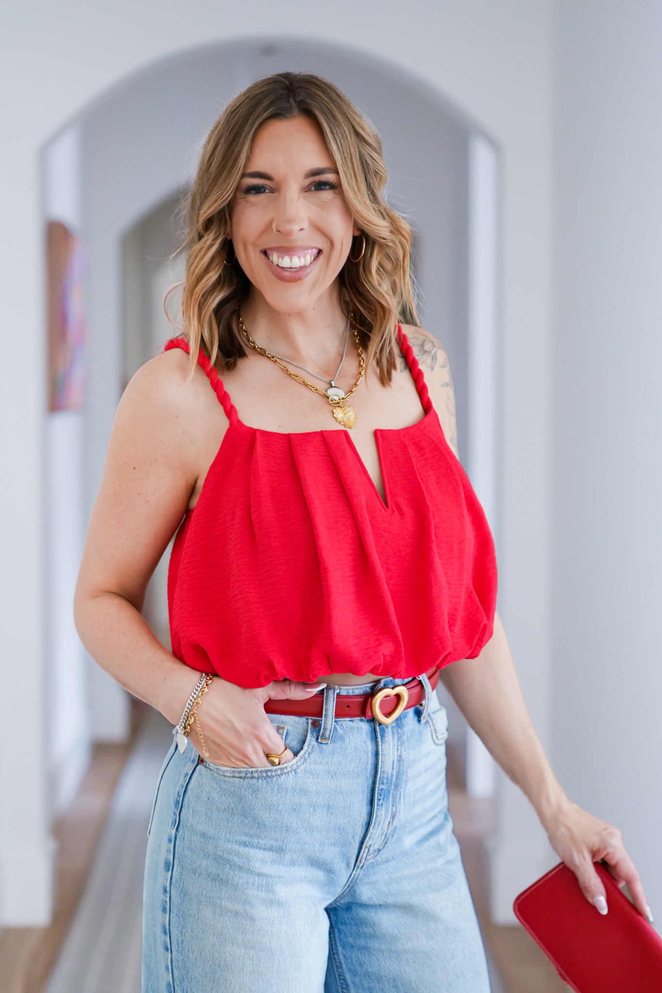 Sleeveless Twist Strap Bubble Hem Top