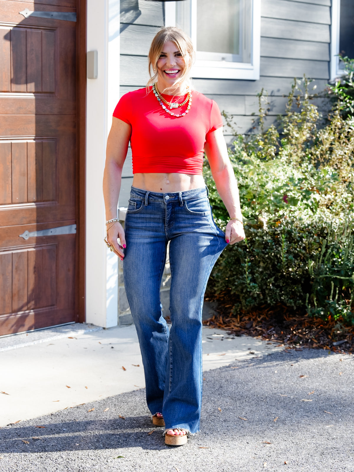 Risen Mid Rise Medium Wash Flare Jeans With Double Side Seam