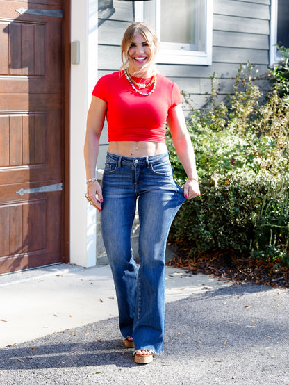 Risen Mid Rise Medium Wash Flare Jeans With Double Side Seam