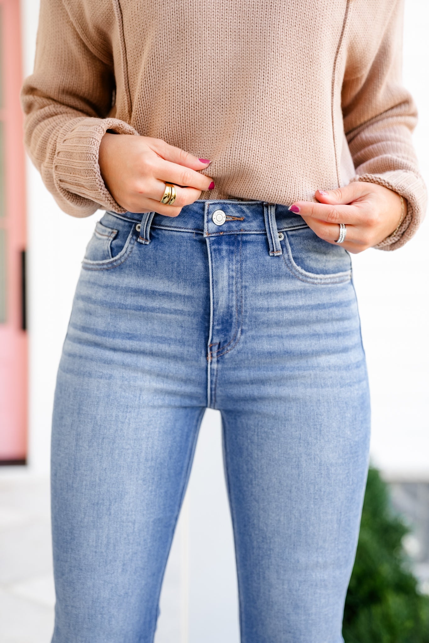 High Rise Medium Wash Flare Jeans with Raw Hem